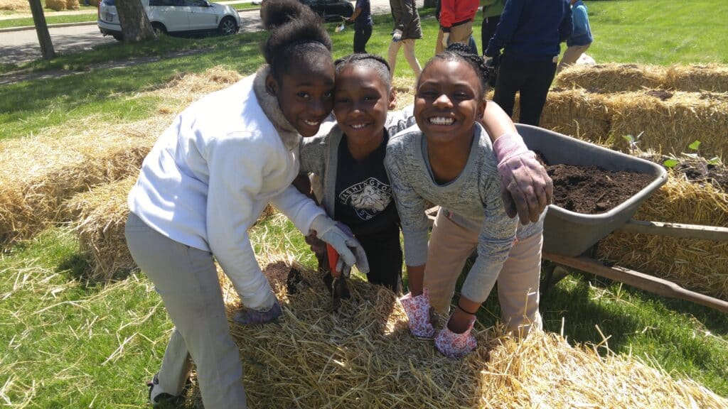 Kids enjoying a field trip through Organic Connects.