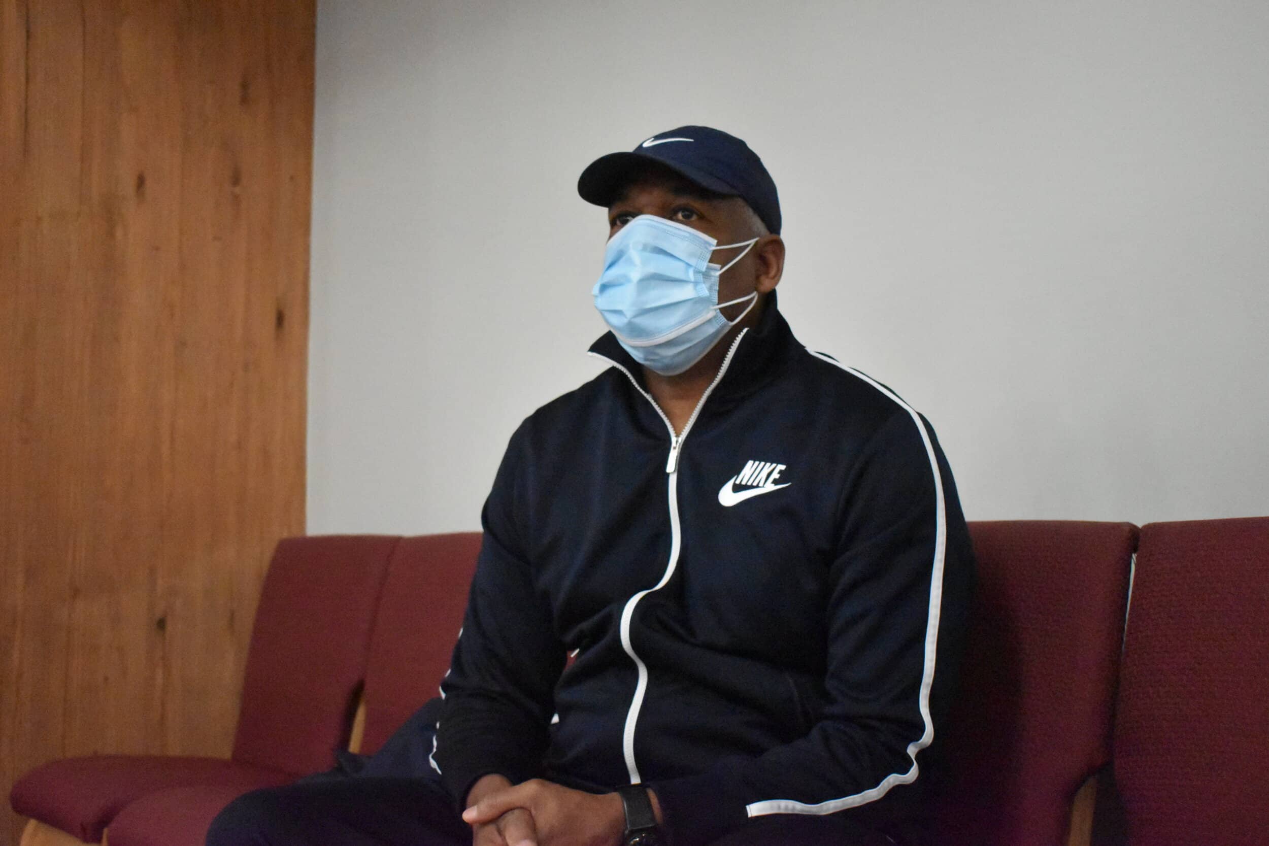 Andre Cisco, a Bedford Heights resident, pauses for a moment on a bench after getting his second dose of the vaccine at a clinic at his church, Affinity Missionary Baptist Church. Photo: Conor Morris.