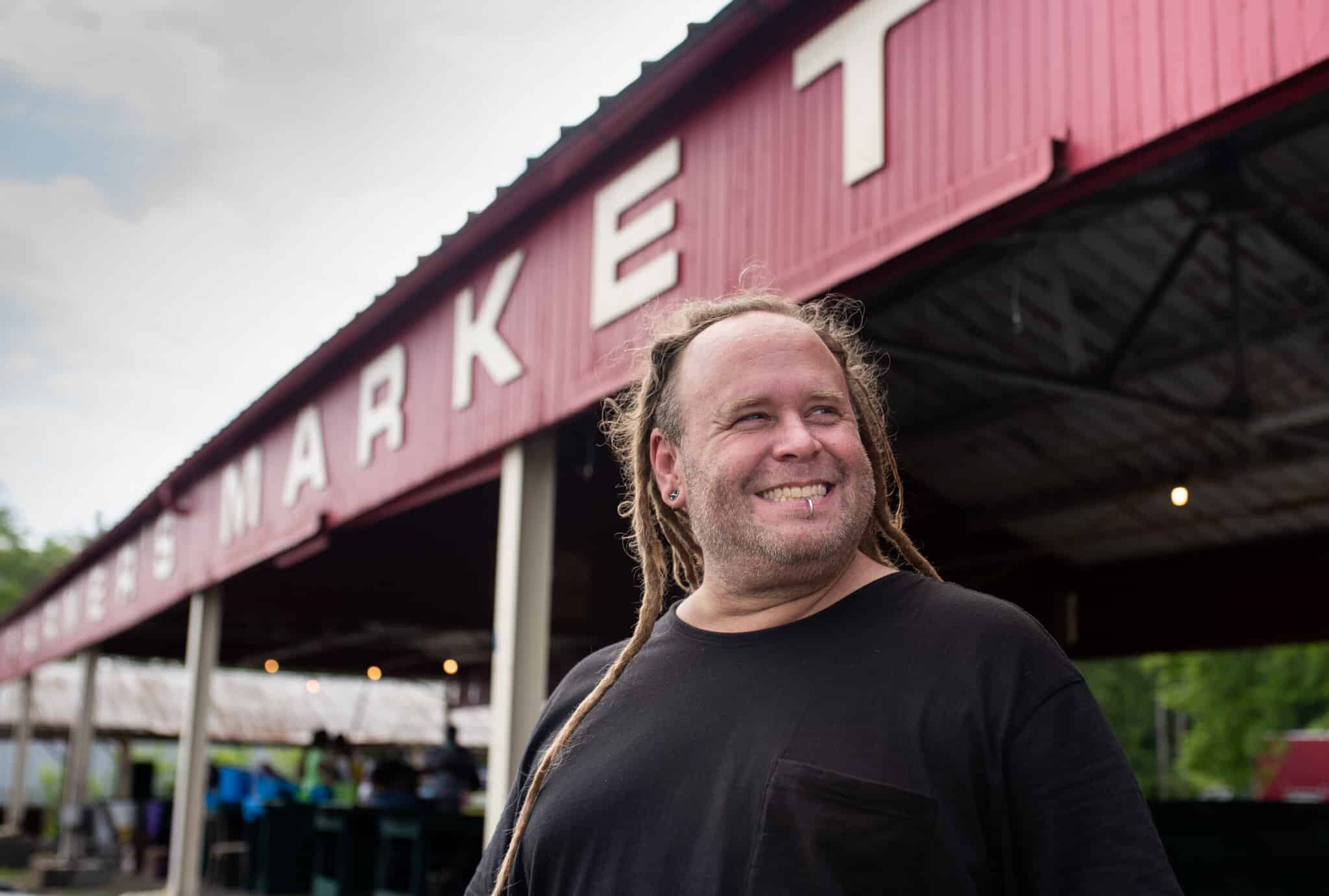 Kevin Scheuring, the manager at Coit Road&nbsp;Farmers&nbsp;Market&nbsp;in East Cleveland, stands in front of the 100-year-old&nbsp;market&nbsp;where residents buy fresh produce from urban&nbsp;farmers. About half of the sales coming into the&nbsp;market&nbsp;are from incentive programs, which are offered to people in need.