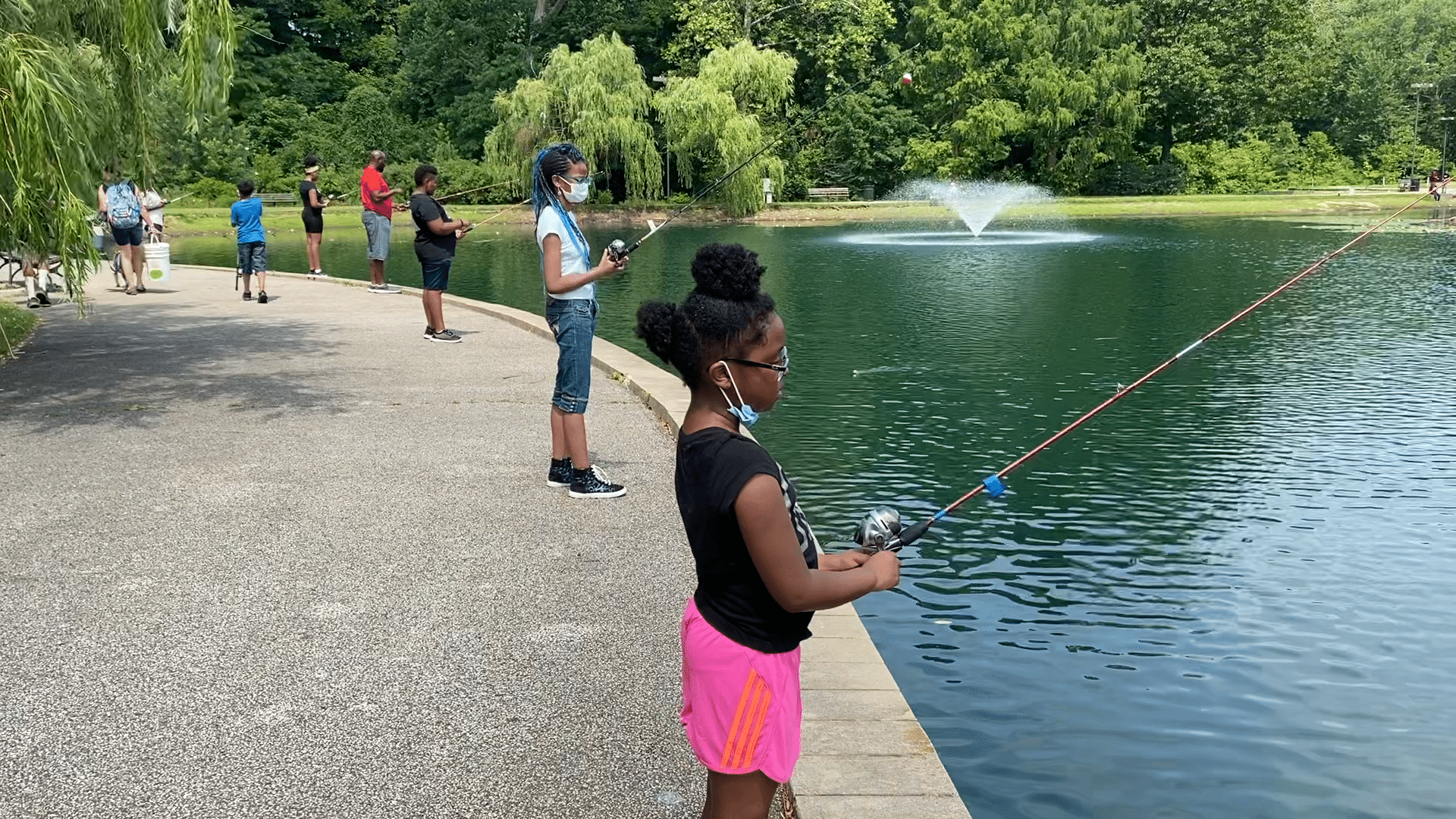 Organic Connects participants fishing at Rockefeller Park. Contributed photo.