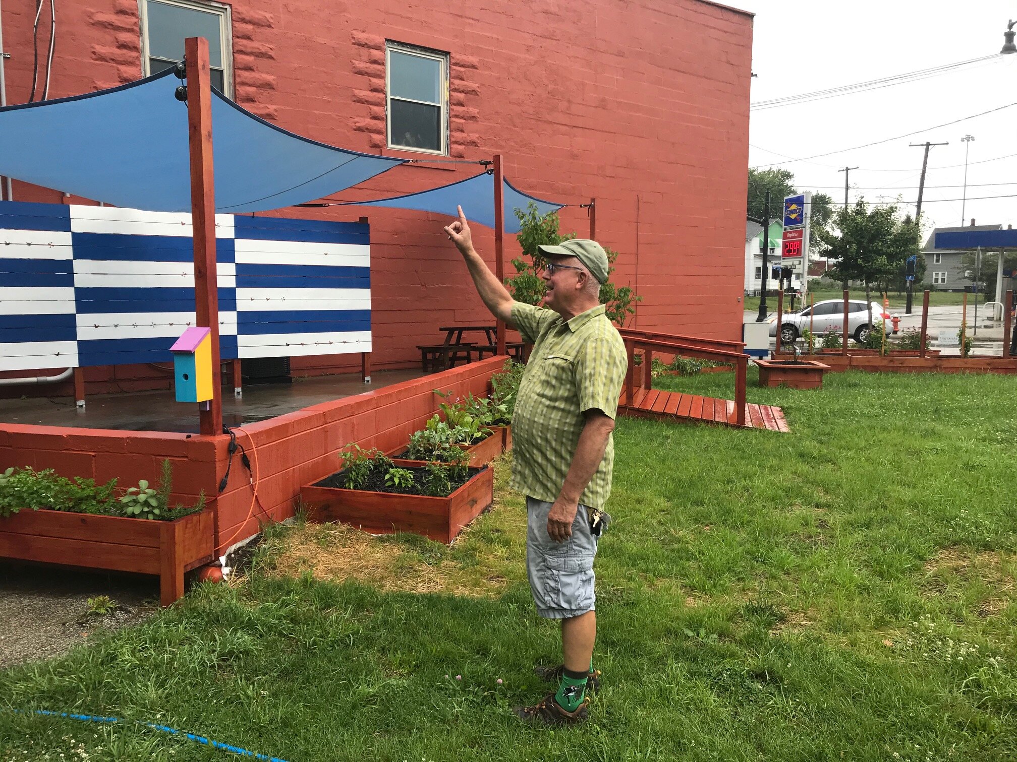Michael Loderstedt explains the green features behind The Blue Windmill, his garden and outdoor stage on Waterloo Road.