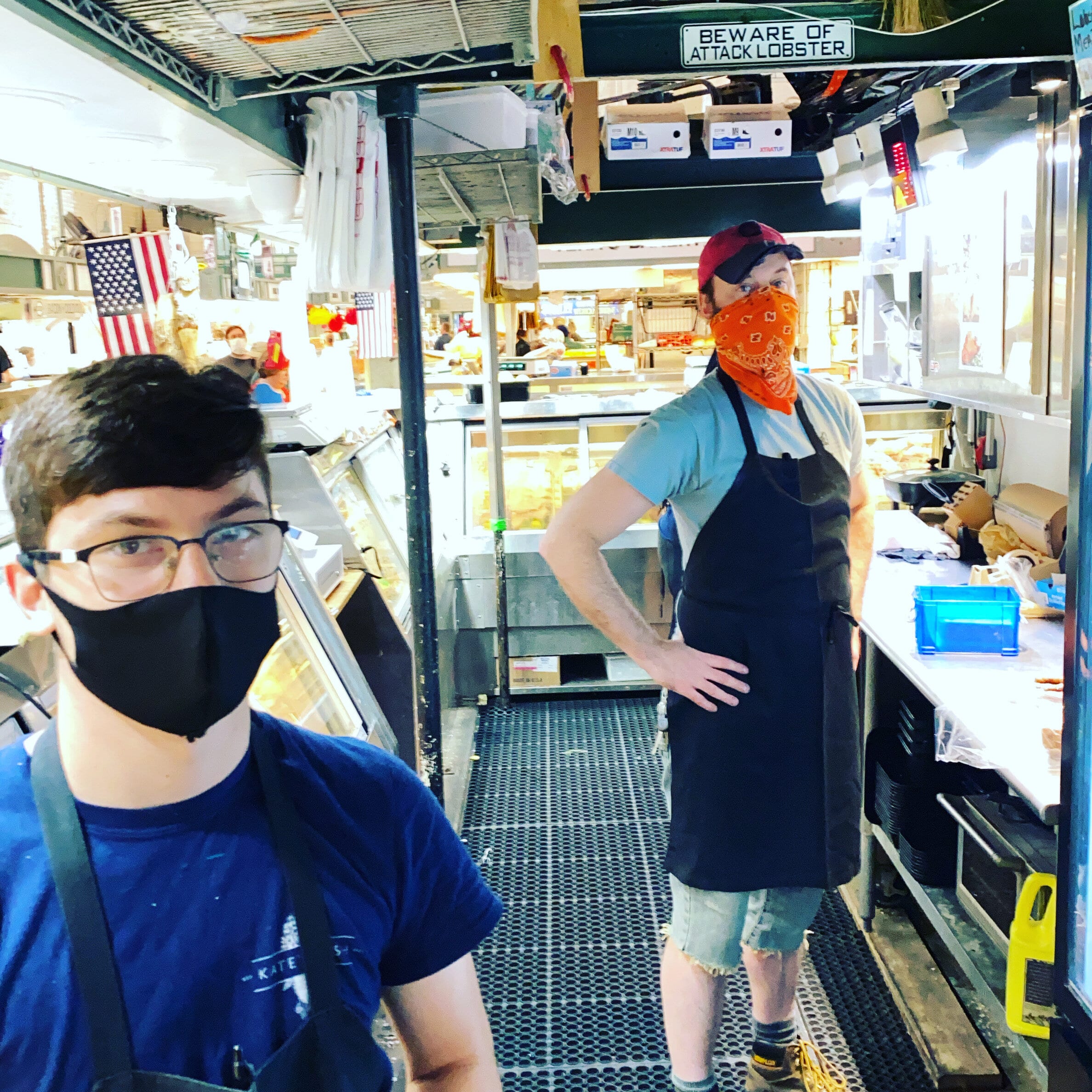 These fishmongers wear masks