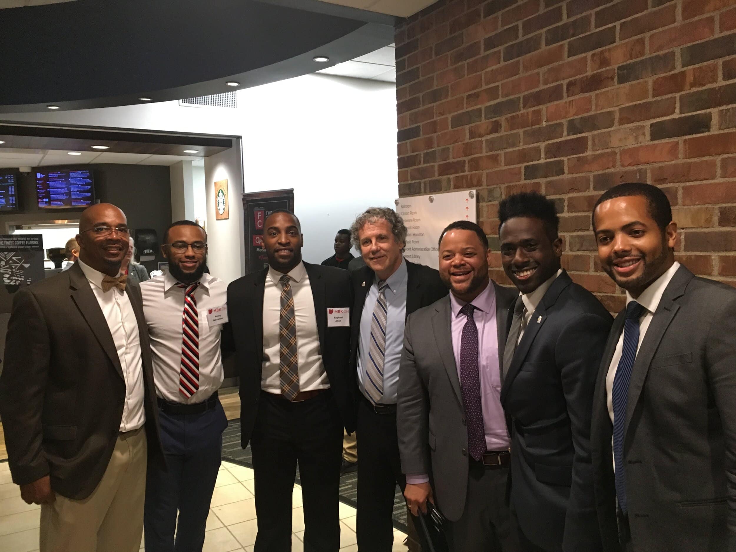 From the left: Chris Wallace, Springfield City Schools; Henry Alexander, AmeriCorps VISTA; Raphael Allen, Clark State Community College; Senator Sherrod Brown; Michael Smith, Director of Youth Opportunity Programs at the Obama Foundation and Executi…