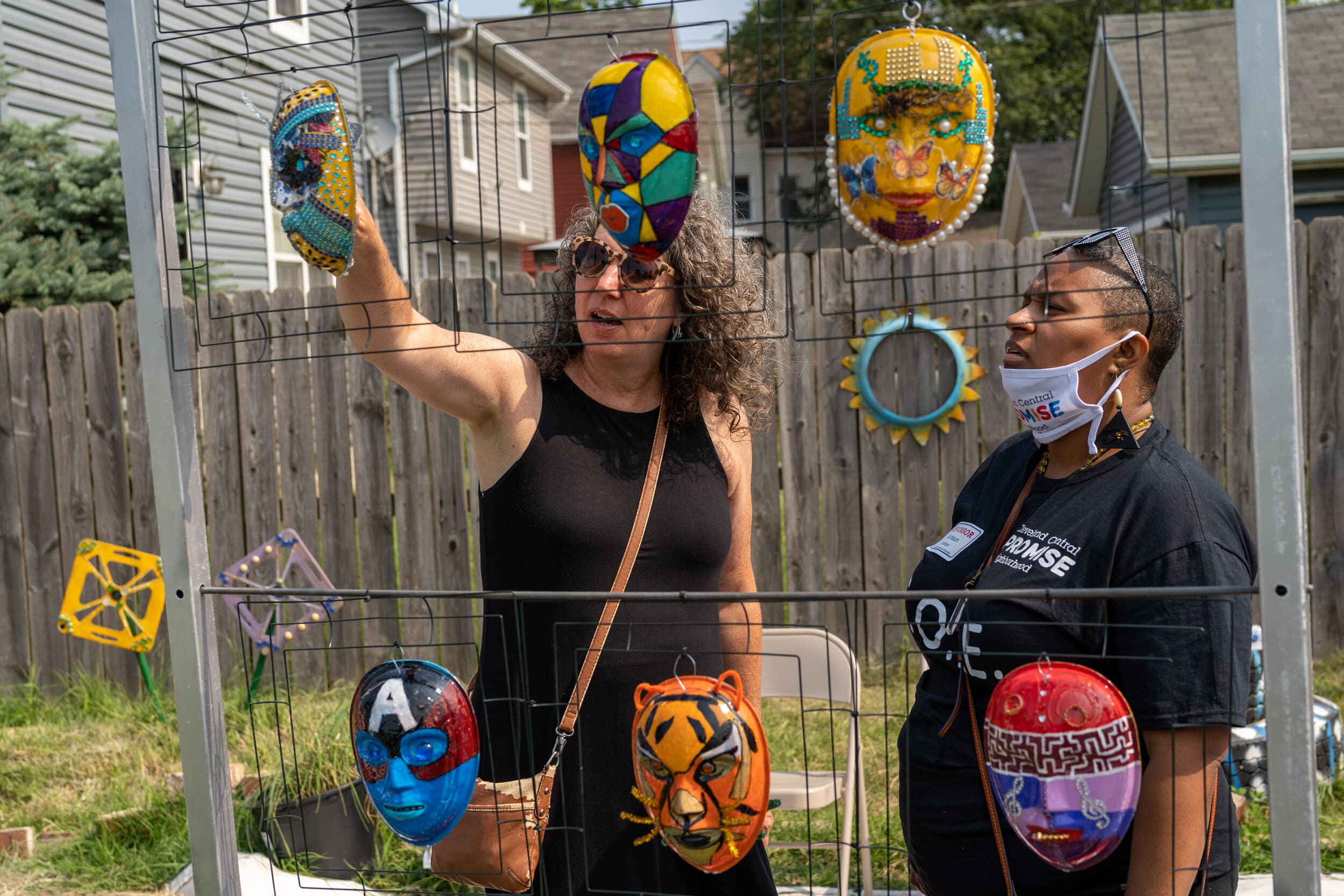 Visitors admire handmade masks. Contributed photo from C.O.P.E