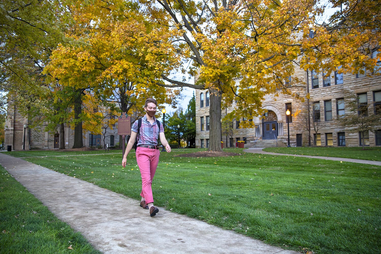 Dan Eggers walking to class at Baldwin Wallace University. Photo by Karin McKenna.