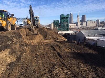 Grading of Red Line Greenway trail near RTA viaduct and Franklin Connector. Photo courtesy Cleveland Metroparks.