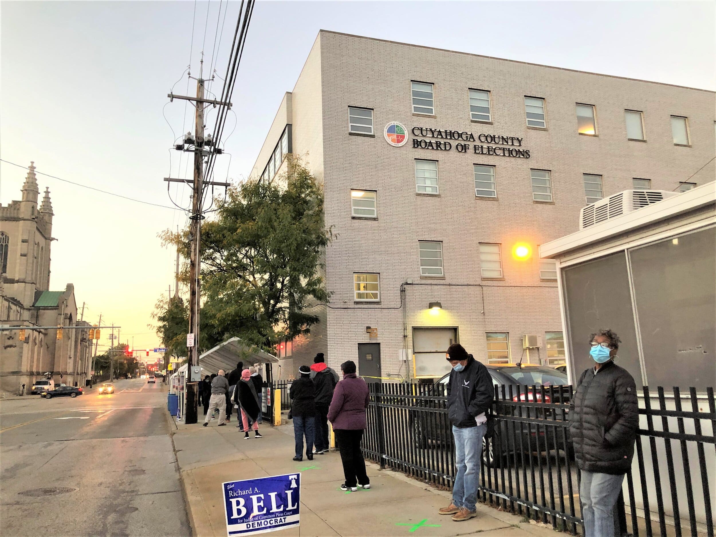 Lines for early voting formed at 6 am outside the Cuyahoga County Board of Elections.