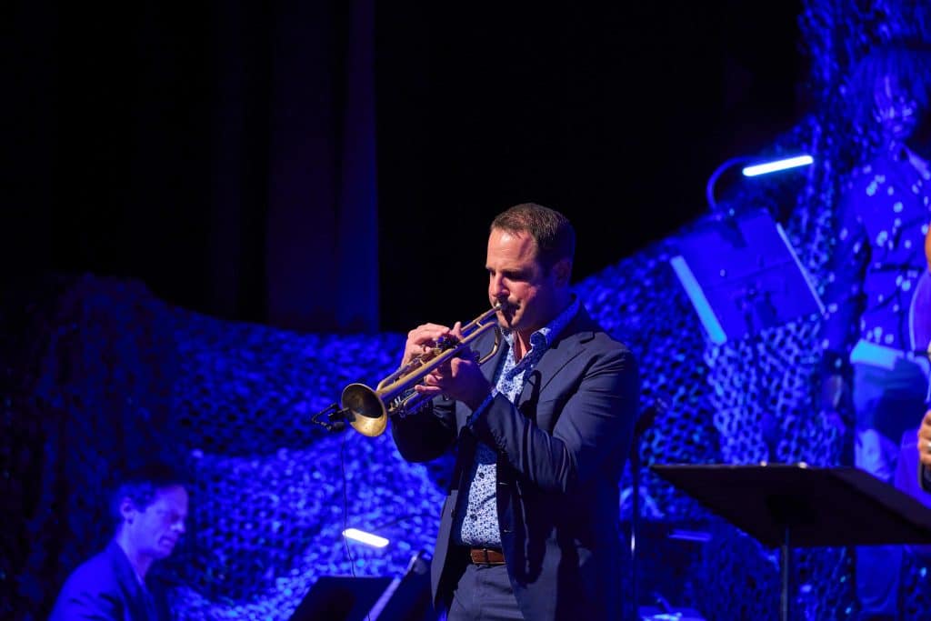 Dominick Farinacci playing the trumpet.