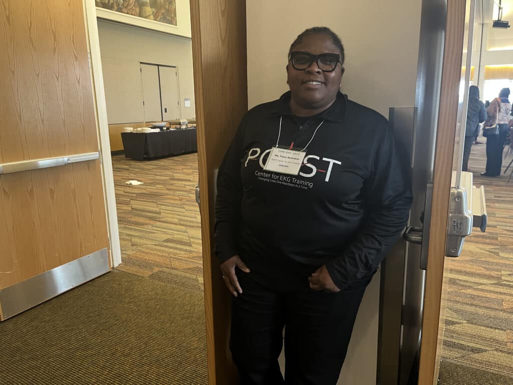 CHW instructor Tracy McArthur smiling for a photo at the Community Health Worker Day event. 