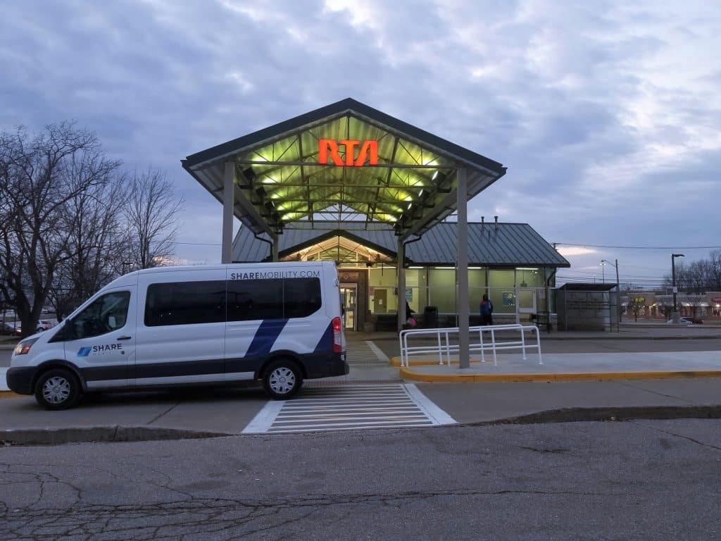 A SHARE Mobility van at the entrance to the Southgate Transit Center. 