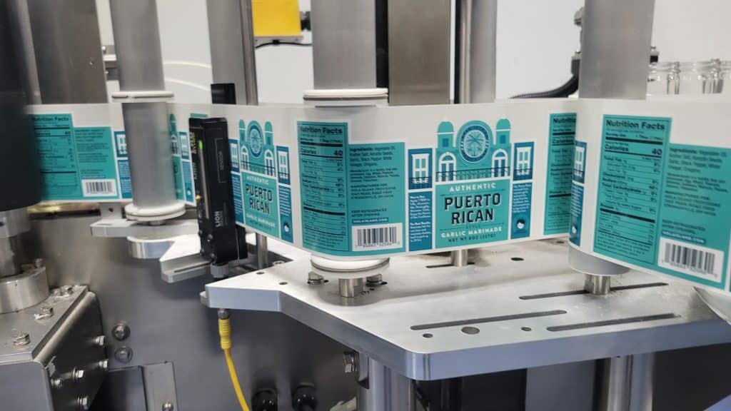 Puerto Rican marinade labels in a labelling machine. 