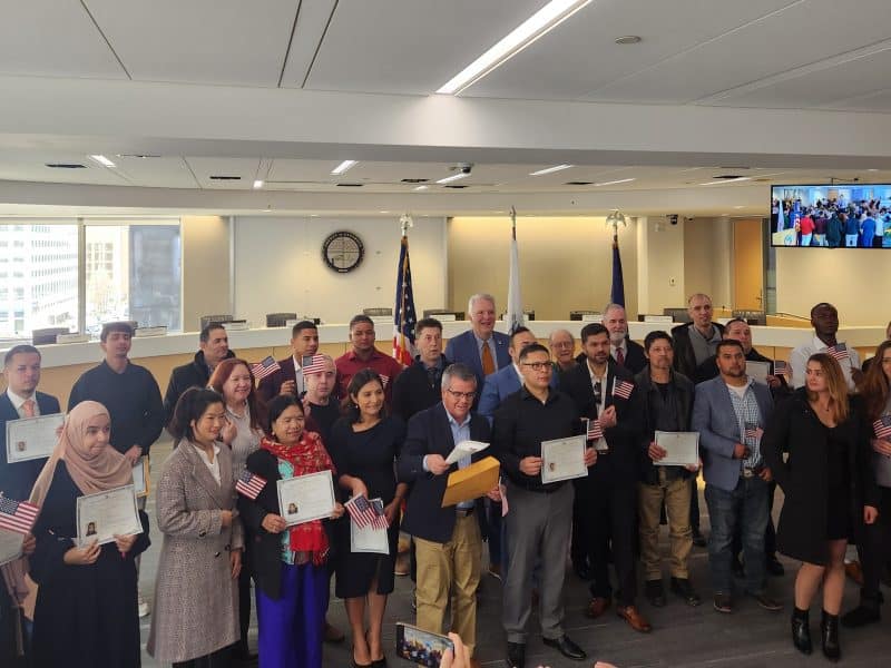 Group of immigrants celebrating their American citizenship at a Cleveland, OH